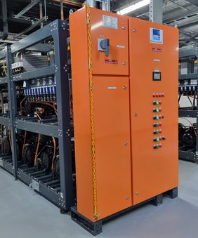 Completed SCM REF Australia CO₂ rack with orange switchboard ready for dispatch