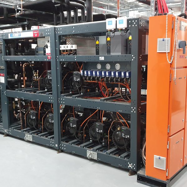 SCM REF Australia CO₂ transcritical refrigeration rack with orange control panel in the Bankstown facility