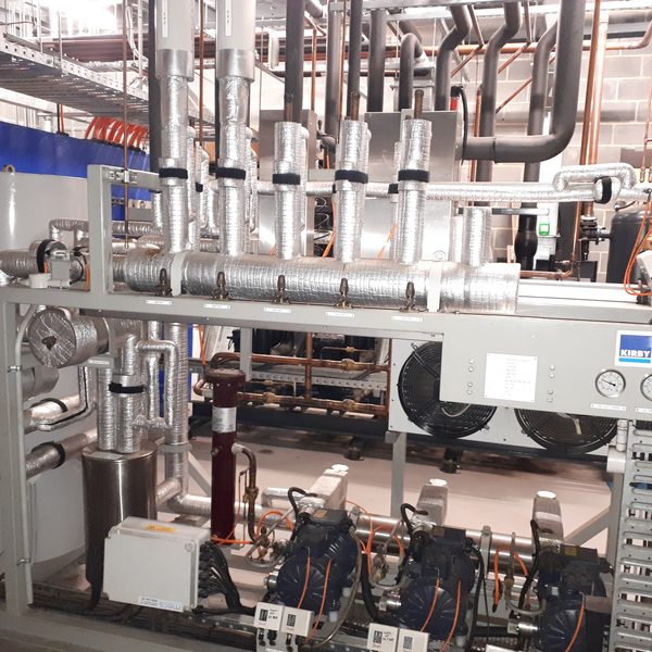 Insulated pipework and compressors on an engineered refrigeration system